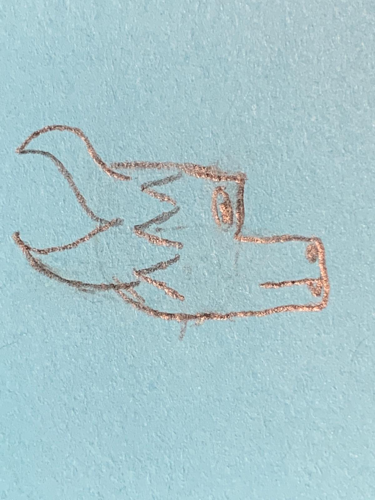 A kobold with four horns on the back of his head (only two are shown due to perspective) and three frills on each of the sides of his head. He also has a slightly pronounced snout and little fangs.