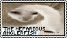 A cat who's head is poking out of the bottom of some sort of cat-tree platform's hole, with her tail sticking out above her head. Blinking text reads 'the nefarious anglerfish'